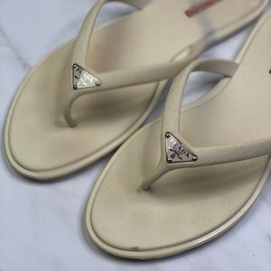 PRADA • Authentic Off White Logo Flip Flops
